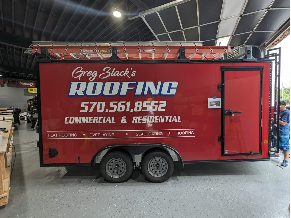 trailer wrapping for greg slack roofing company